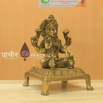 Laxmi Sitting In Padmasana